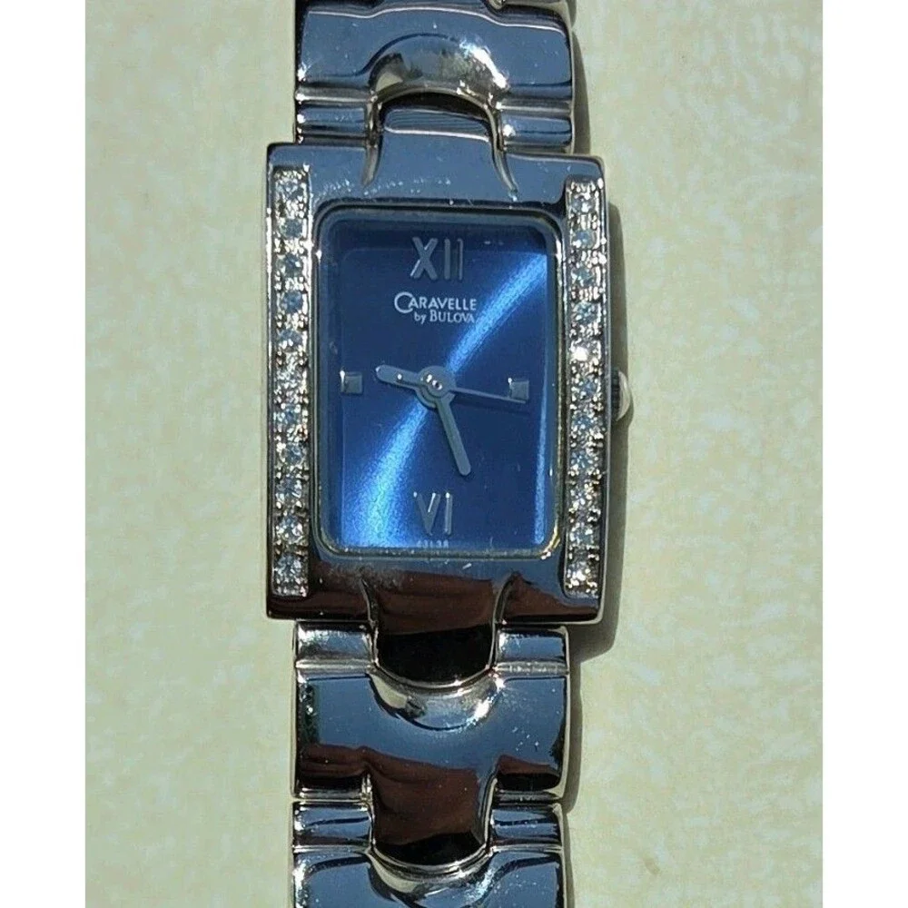 Caravelle by Bulova Silver Rectangle Analog Dress Wristwatch Metal Bracelet